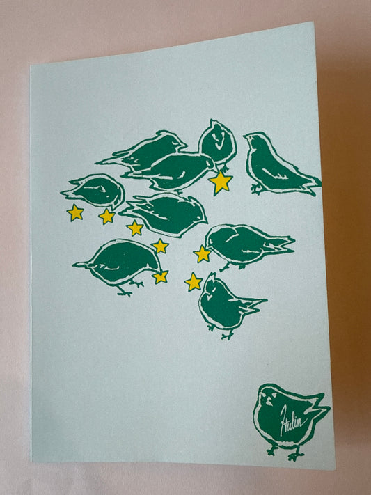 “Birdies Feeding on Stars” greeting card